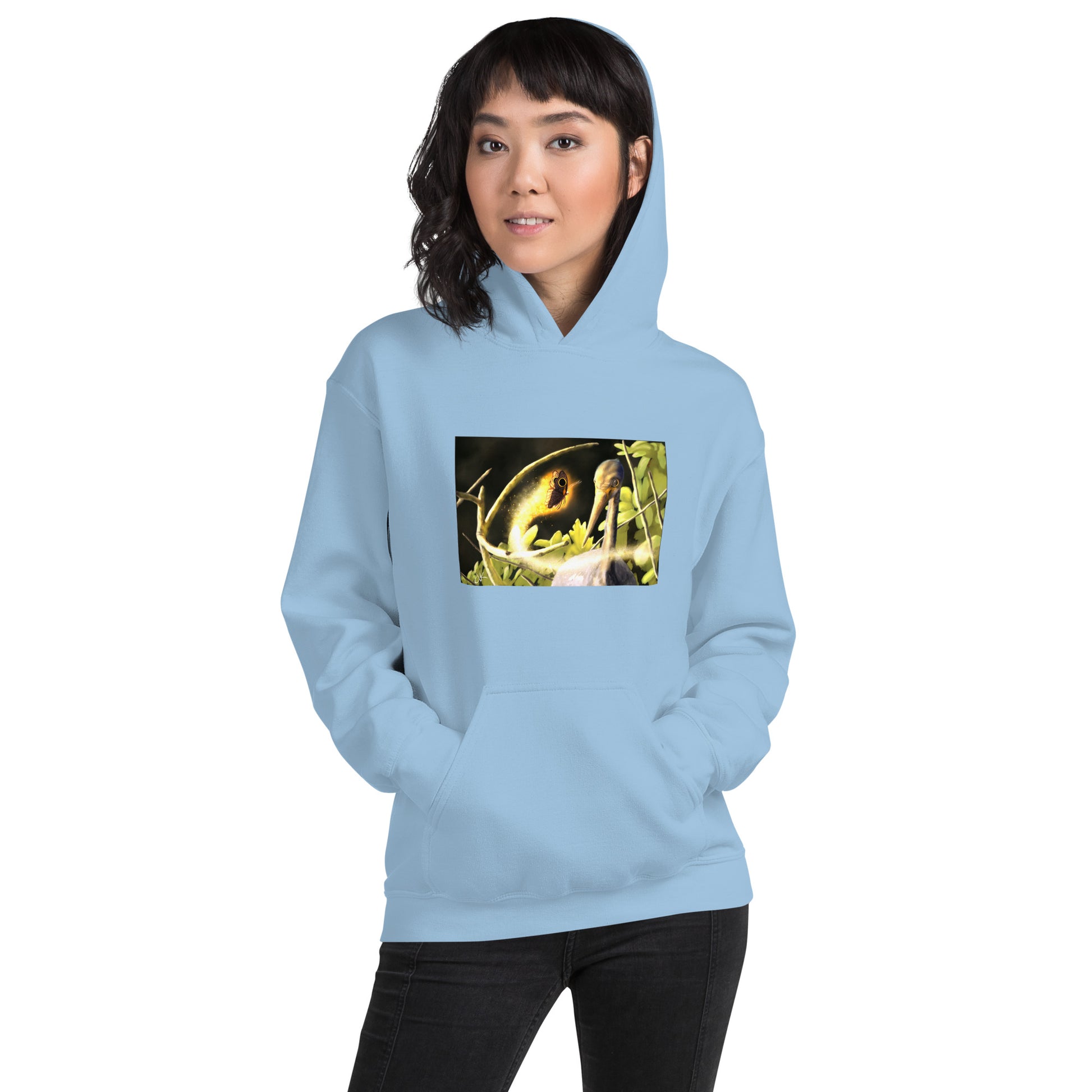 This printed hoodie of a digital painting is the first image in an ongoing series where animals meet special glowing insects face to face. In this particular encounter, a tricolor crane meets a luminescent butterfly. This digital wildlife animal painting print design is printed on a cozy hoodie.