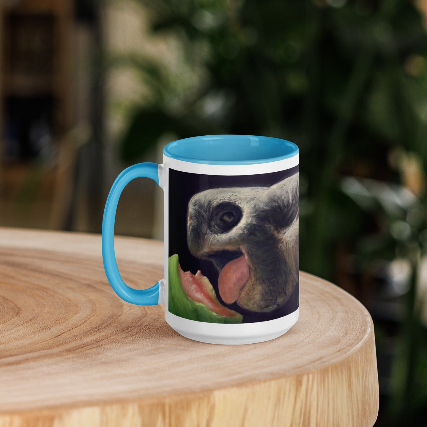 This digital wildlife animal painting print design is of a very cute tortoise munching on a juicy watermelon. These animals have large chubby bodies contained within massive heavy shells along with cute and sympathetic eyes. This digital wildlife animal painting print design is printed on colored mugs perfect for enjoying your favorite beverages.